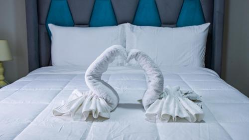 Cama o camas de una habitación en Esmeralda Suites Cusco