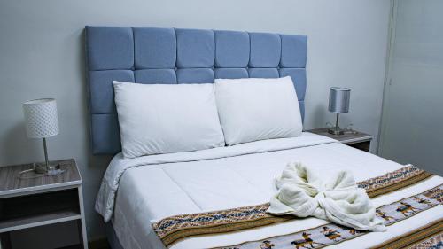 Cama o camas de una habitación en Esmeralda Suites Cusco