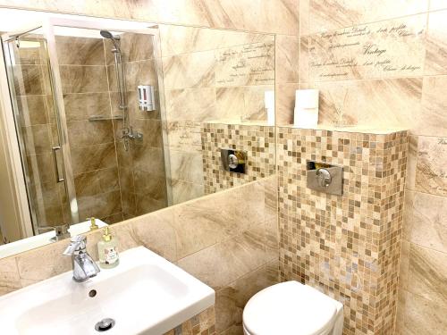 Ένα μπάνιο στο Apartament S19