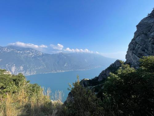 a view of a body of water from a mountain at Ledro Luxury Spa House in Ledro