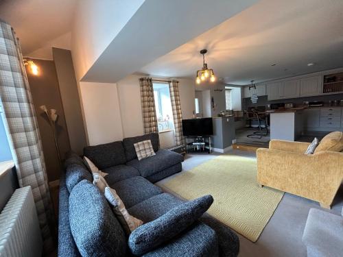 Posezení v ubytování Bakers Cottage