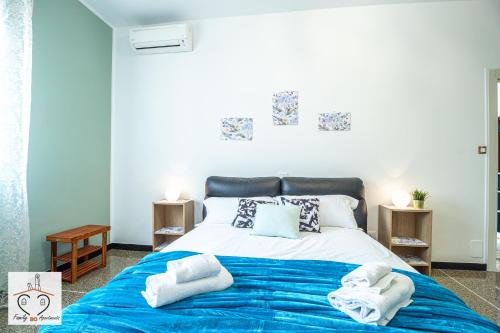 Ένα ή περισσότερα κρεβάτια σε δωμάτιο στο FamilyBO Apartments Ristori Fiera