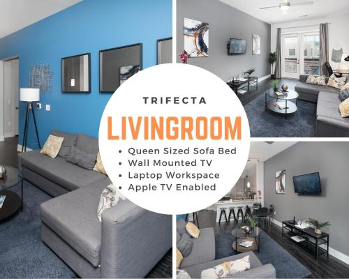 a living room with a gray couch and a blue wall at Trifecta Luxury Serviced Apartment in Uptown CLT in Charlotte
