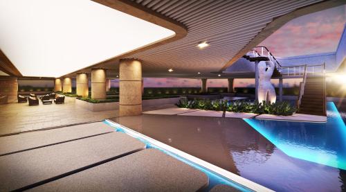 uma representação de uma piscina num edifício em M Haven em Manila