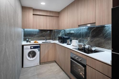 Cucina o angolo cottura di Park Avenue Clemenceau