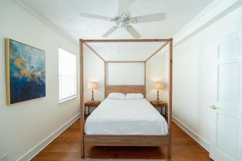 a bedroom with a bed and a ceiling fan at Society Hill, Historical Luxury Home, 3Bd/2.5Ba in Philadelphia
