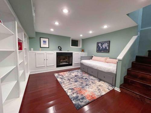 a living room with a couch and a fireplace at Society Hill, Historical Luxury Home, 3Bd/2.5Ba in Philadelphia
