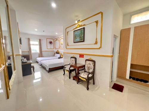 Katil atau katil-katil dalam bilik di King Hotel Quang Ngai
