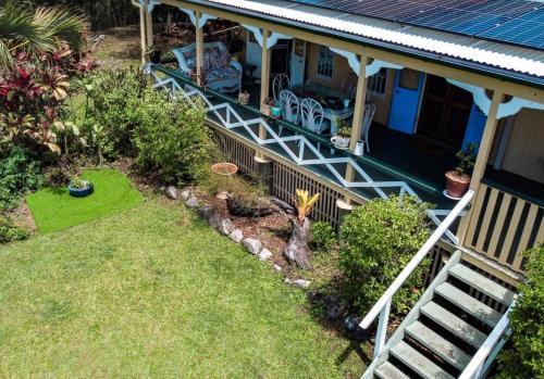 an aerial view of a house with a yard at Noosa Hinterland Escape in Black Mountain