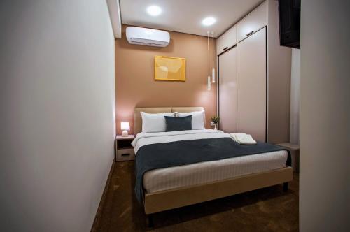 Postel nebo postele na pokoji v ubytování The House Hotel Yerevan