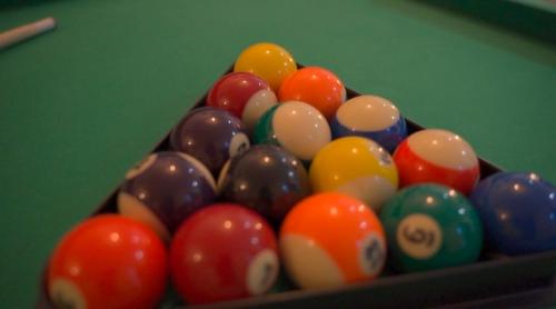 a group of pool balls in a pool table at Dream Retreat Luxury Apartment with Super King Bed, Pool Table PS4 - Sleeps 5 Free Parking in Bradford