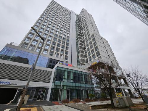 a large building with two tall buildings at Hygge 722 Blue Ocean4 in Incheon