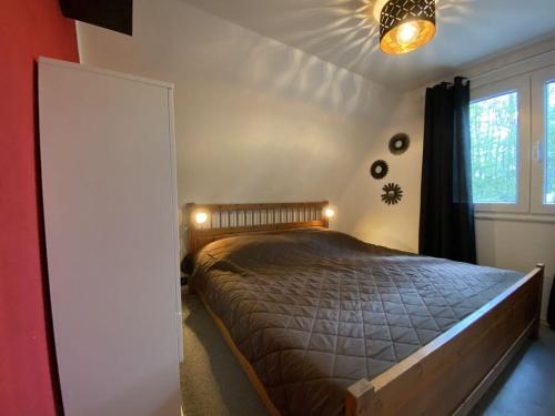 Ένα ή περισσότερα κρεβάτια σε δωμάτιο στο Holiday home Seehütte