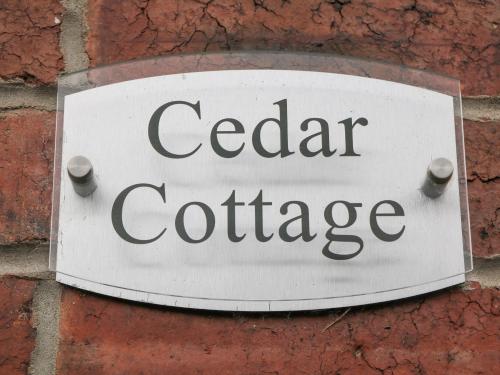 Sijil, anugerah, tanda atau dokumen lain yang dipamerkan di Cedar Cottage