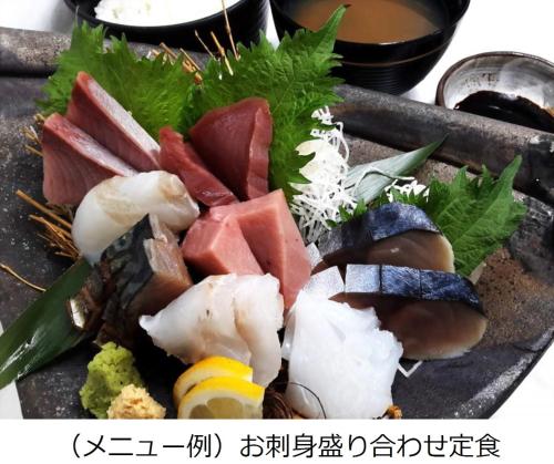 a plate of food with sushi and other foods at Hotel Alpha-One Matsue in Matsue