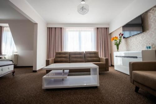 Χώρος καθιστικού στο Hotel Pałacowa