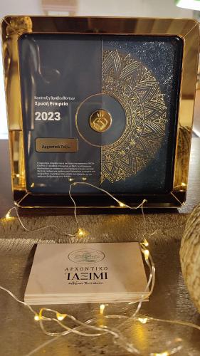 a box with a pair of glasses on a table at Αρχοντικό Ταξίμι (Μουντζουρίδη) in Argalasti