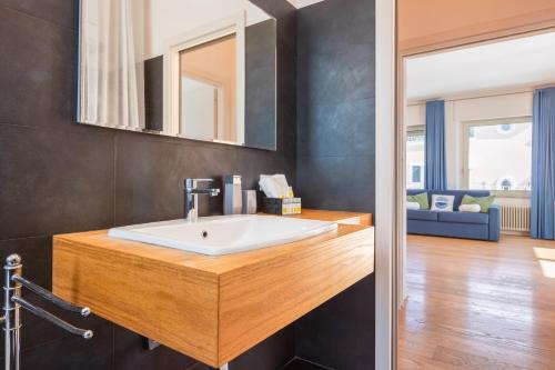 a bathroom with a sink and a mirror at Villa Marcello in Cagliari