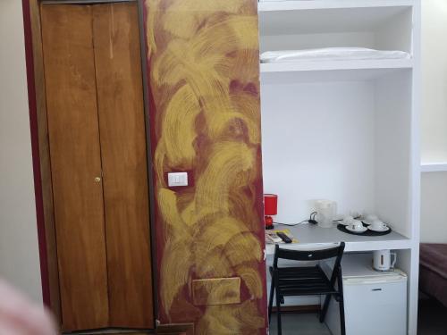 Kuchyň nebo kuchyňský kout v ubytování Enjoy Roma