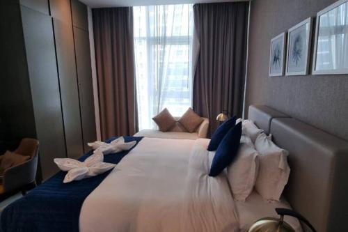 Ένα ή περισσότερα κρεβάτια σε δωμάτιο στο Beautiful 1 Bed Hotel Apartment