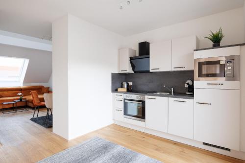 SYMPHONY Apartments 42 - Modern Loft with Terrace and Grill in Central Location