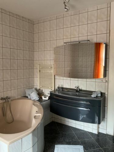 Ванна кімната в Apartment an der Honigbar