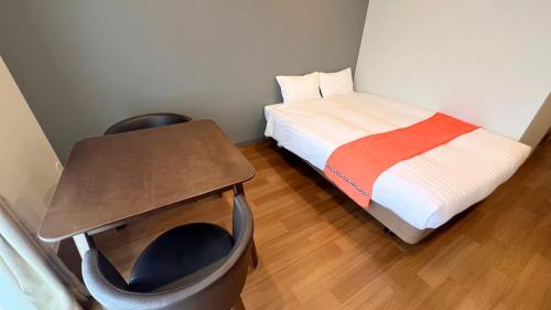 Postel nebo postele na pokoji v ubytování Apartment Hotel Ecott