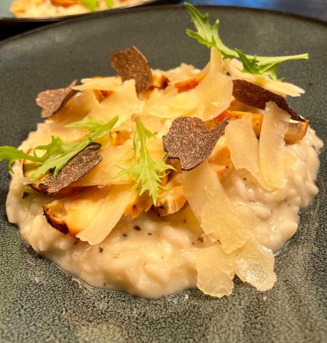 a plate of food with a pile of food at Logis Hôtel & Restaurant Le Vert Bocage in Franqueville-Saint-Pierre