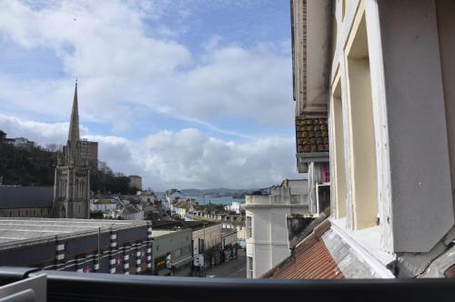 a view of a city from a window at Hotel Peppers in Torquay