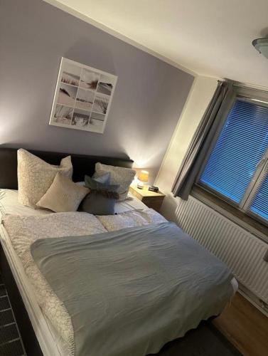 Ένα ή περισσότερα κρεβάτια σε δωμάτιο στο Captain Lodge