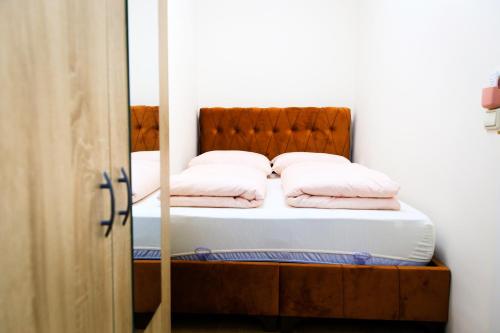 Posteľ alebo postele v izbe v ubytovaní Apartment Custozza