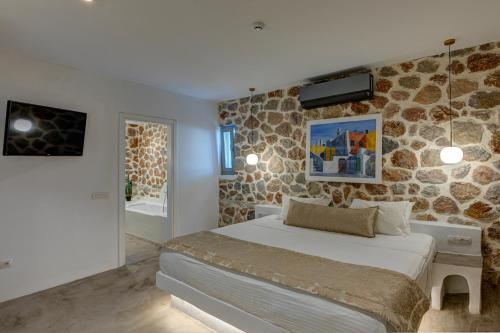 Postel nebo postele na pokoji v ubytování Desiterra Resort & Spa