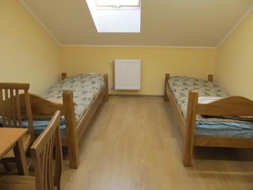 Katil atau katil-katil dalam bilik di Mini-hotel Na Pidgradskiy