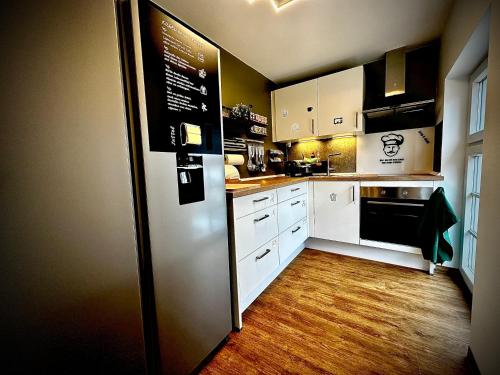 Privathotel Riesenbeckにあるキッチンまたは簡易キッチン
