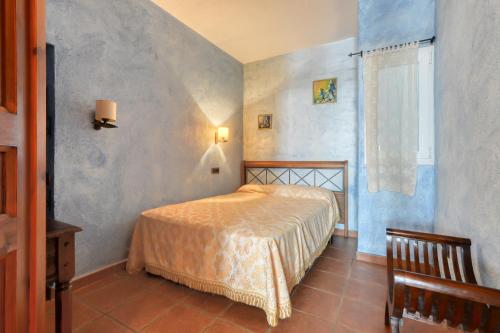 A bed or beds in a room at Casa Puig Rom 45 Roses - Immo Barneda