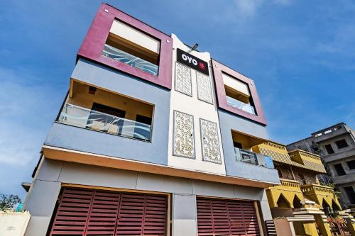 a building with many windows on top of it at OYO Home Modern Stay Near Iter in Khandagiri
