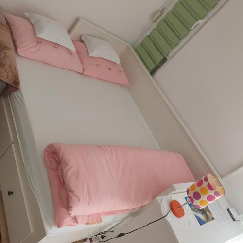 Postel nebo postele na pokoji v ubytování VJEKA HOME