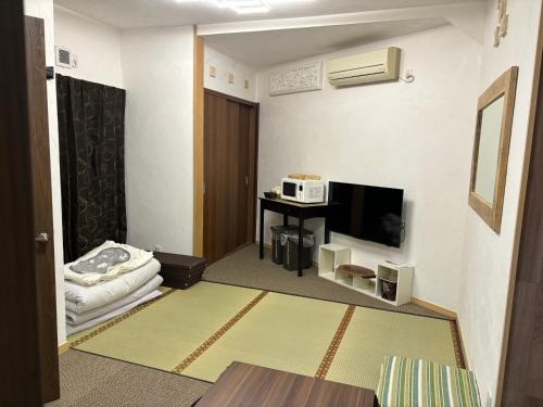 Televisyen dan/atau pusat hiburan di hanamaru-house