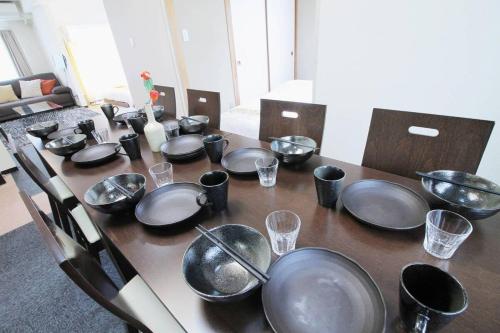 Cuisine ou kitchenette dans l'établissement Ishiki - Best location 2 min HiroshimJR station, Up to 10 ppl