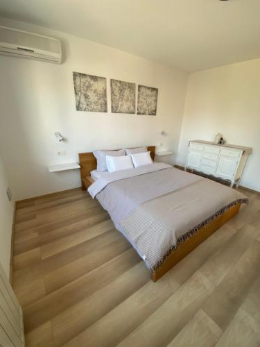 Letto o letti in una camera di Vita2