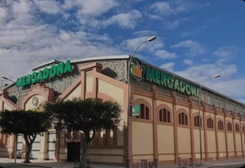 a building with a sign on the top of it at El MIRADOR DE LA PLAYA in Melilla
