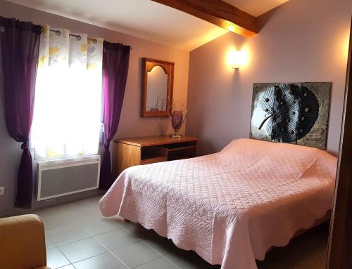 Posteľ alebo postele v izbe v ubytovaní Bergerie du Pic Saint-Loup