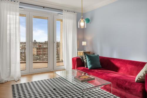 Χώρος καθιστικού στο CLS Zentrale City-Wohnung in Hamburg mit E-Laden und Tiefgarage, Klimaanlage, gratis WLAN, Smart TV, großer Balkon, Blick über Hamburg, Parkplatz, Cafe im Haus, Bushaltestelle direkt gegenüber, Flex Check In
