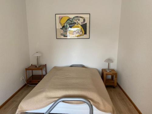 Postel nebo postele na pokoji v ubytování Ferienwohnung in ruhiger Idylle