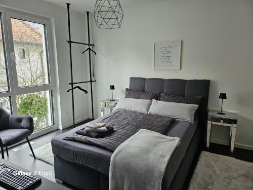 Llit o llits en una habitació de Neue hochwertige Wohnungen