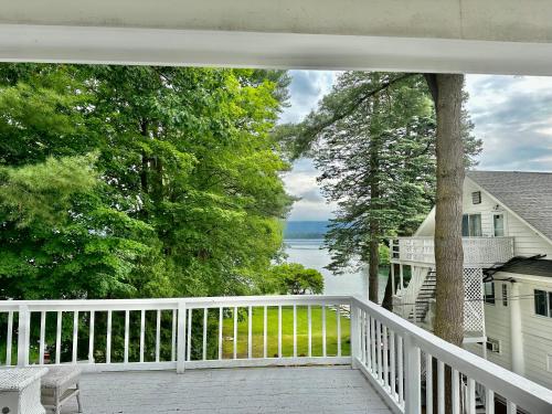 a balcony with a view of the water at The Villas on Lake George in Diamond Point