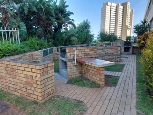 Un jardín fuera de Sea facing apartment 1703 on High Tide Amanzimtoti