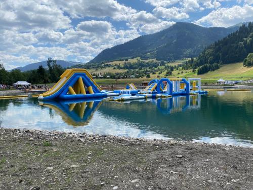 a row of slides in a water park at Appartement d'une chambre avec balcon a Praz sur Arly in Praz-sur-Arly