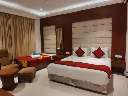 Postel nebo postele na pokoji v ubytování Hotel Z Suites Mahipalpur-Delhi Airport