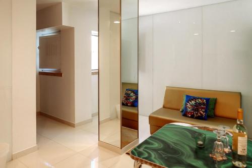 a room with a bed and a mirror and a chair at Lisbon Art Stay Apartments Baixa in Lisbon